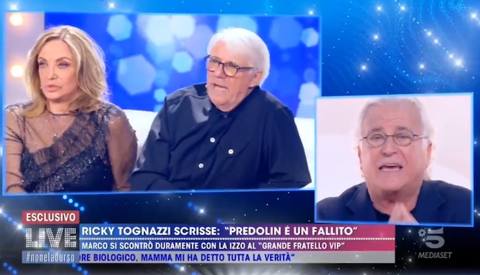 Live – Non la D’Urso, Predolin vs Ricky Tognazzi: «Finalmente posso guardare in faccia questo stron*o». Lui ribatte: «Incapace. Stai molto attento a dove esci»