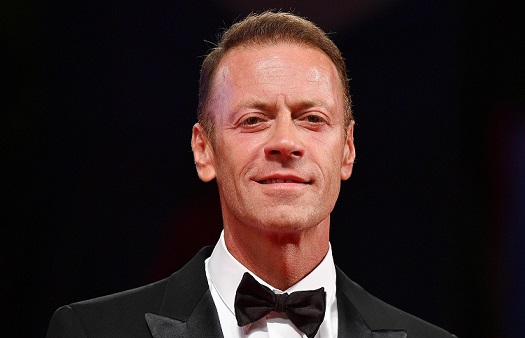 Programmi TV di stasera, mercoledì 28 aprile 2021. Rocco Siffredi vs Orietta Berti a «Name That Tune»