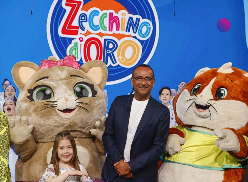 Lo Zecchino d’Oro 2021: Carlo Conti conduce la finale, il resto a Fialdini-Conticini. Baglioni e Masini tra gli autori dei brani