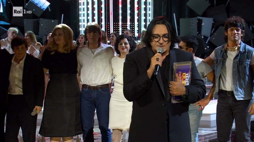 Ascolti TV | Venerdì 14 luglio 2023. Tali e Quali in replica al 16.3% vs La Ragazza e l’Ufficiale 14%, Chicago P.D. sale al 9.4%, Quarto Grado 9.6%. Sinner-Djokovic 6.3%