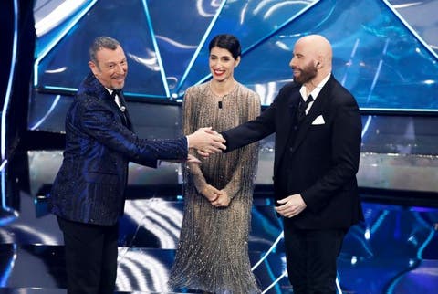 Amadeus, Giorgia e John Travolta - Sanremo 2024 (AGI per US Rai)